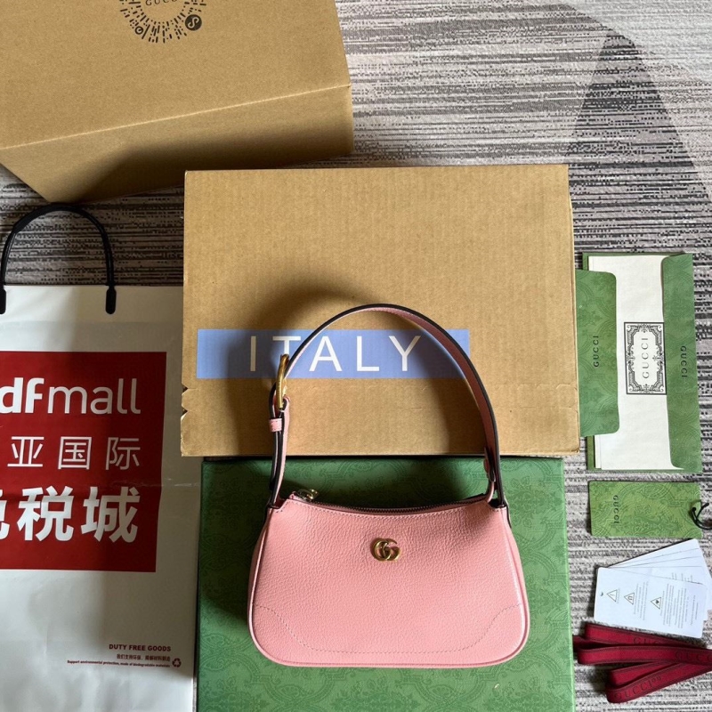 G*u*i top handle bags